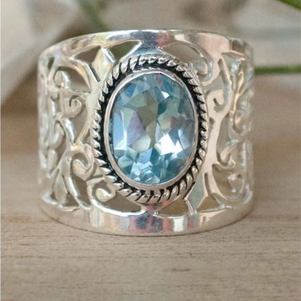NWOT Fashion Silver Filigree Ring with Light Blue Oval Gem